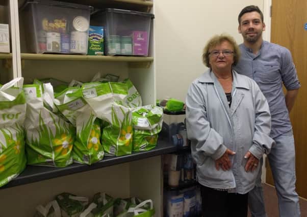 Epworth Baptist Church Minister Andy Wilkinson with food bank volunteer  Janet Grayston