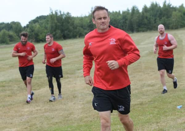 Francis Cummins, pictured in the foreground during pre-season training.