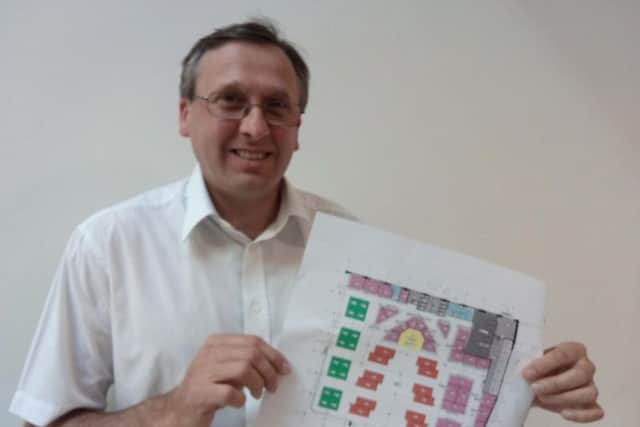 Adrian Pickersgill with the planned layout of the Wood Market