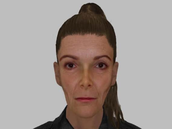 An E-fit has been produced of a woman wanted over the theft of a purse in Doncaster