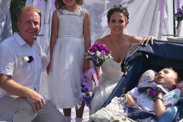 Lewis Jeynes with dad James, step-sister Poppy and dad's fiancee Emma, at their wedding, where he was best man
