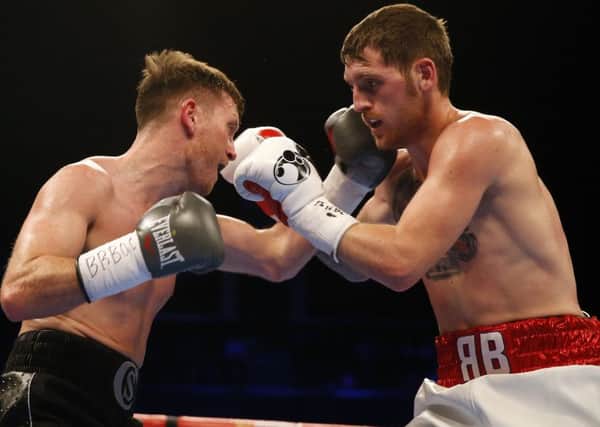 Barrett v Cardle collide forthe British Lightweight Championship in Glasgow.  Pic: Jeff Holmes/PA Wire