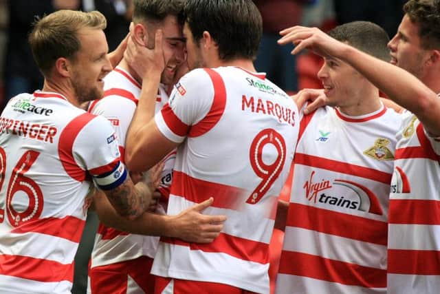 Rovers celebrate the fourth goal.