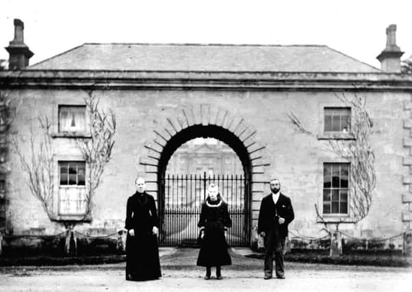Staff outside the gatehouse of Cusworth Hall at the time of Lady Isabella
