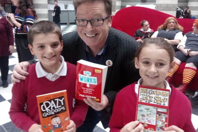 Poet Paul Cookson with youngsters from Town Field Primary School at the Doncaster Book Awards launch