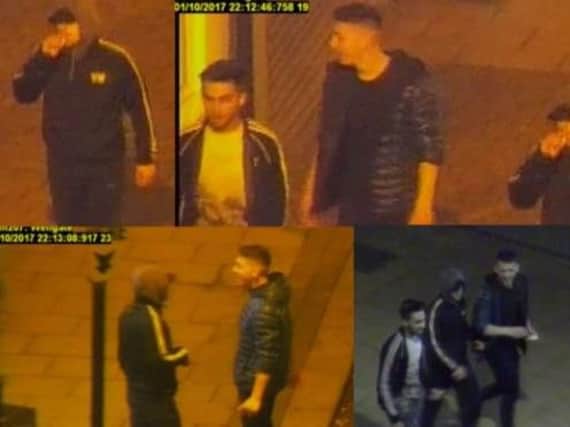 CCTV of the three men wanted by police.