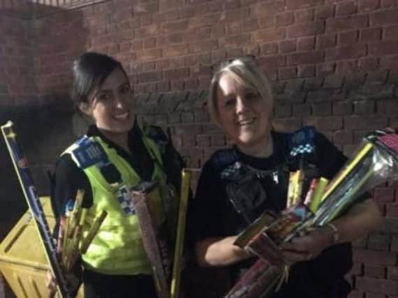 Officers with the confiscated fireworks from Firth Park.