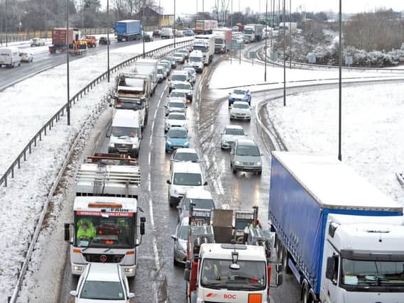 Commuter traffic will meet Christmas getaway traffic on Friday, the RAC has warned.