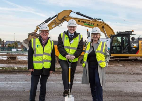 Rotherham Council's Assistant Director of Housing Tom Bell, Cabinet Member for Housing, Councillor Dominic Beck and Jo Jamieson, Managing Director of Wates Residential North at the sod cutting ceremony
