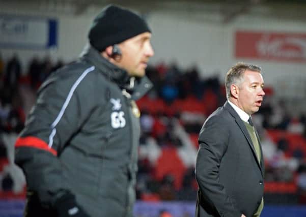 Darren Ferguson, and assistant boss Gavin Strachan, hope to guide Rovers clear of danger over the festive period.