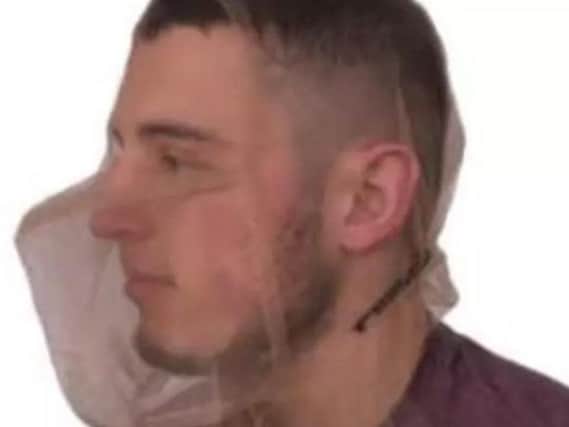 An example of a spit guard.
