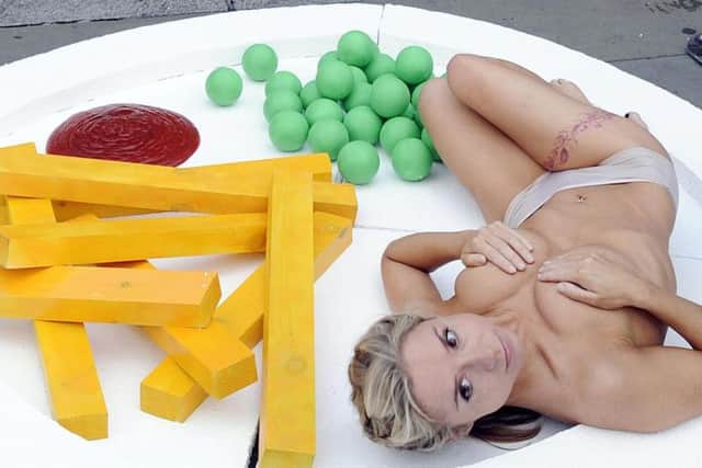The saucy photo for animal rights charity Peta that cost Sarah Jane Honeywell her job.