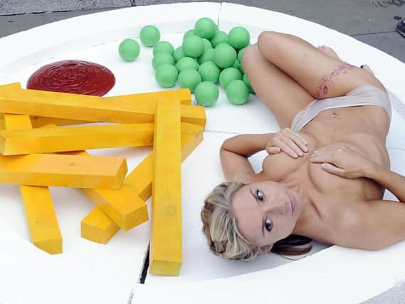 The saucy photo for animal rights charity Peta that cost Sarah Jane Honeywell her job.