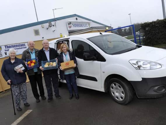 Pictured are volunteers from the Thorne & Moorends Community Hub Food Bank, with the new van they have been given to help with their work outside their HQ The Thornensians Rugby Club, on Church Balk, Thorne.LtoR. Jackie Rothery and Mick Hennessey