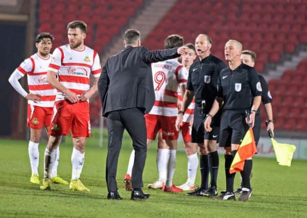 Darren Ferguson confronts the officials after the final whistle against Plymouth.