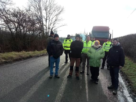 Protesters and police outside the test drilling site for fracking at Misson Springs, near Doncaster