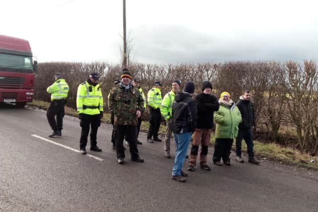 Protesters and police outside the test drilling site for fracking at Misson Springs, near Doncaster