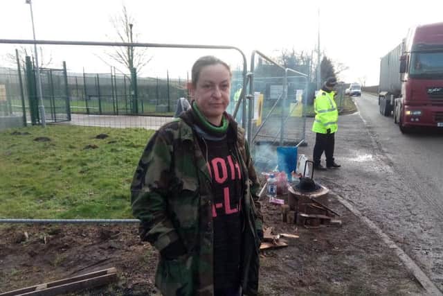 Protester Roz outside the test drilling site for fracking at Misson Springs, near Doncaster