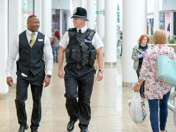 A police officer and security officer at Meadowhall