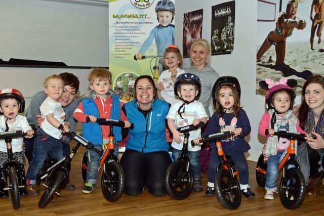 Nichola Caughey, of Baby Bunnies (centre) pictured with parents and children currently taking advantage of the Balanceability classes at Armthorpe Leisure Centre. Picture: Marie Caley NDFP 10-03-15 Baby Bunnies MC 4