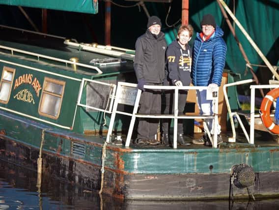 Captains Colin Grace Michelle Lambert and John Betts, pictured on the Adams Ark, which is back in Doncaster, where it was built, for the first time in 30 years. Picture: Marie Caley NDFP Adams Ark MC 1