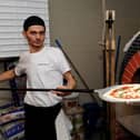 Head chef Michele Magnotta at Proove with a magherita pizza. Picture: Andrew Roe