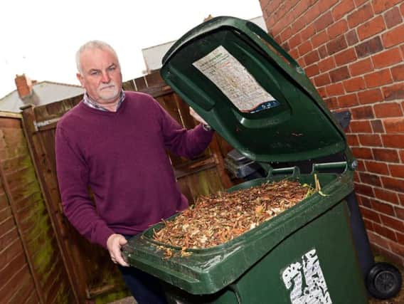 Bobby McGeechan, of Scawsby, pictured with his Green Bin, which will allegedly not be emptied until March. Picture: Marie Caley NDFP Green Bin MC 1