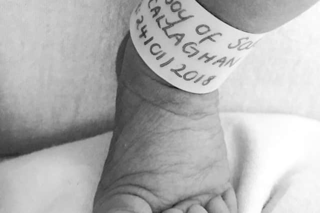 The star shared a photo of her new son's foot on Instagram.