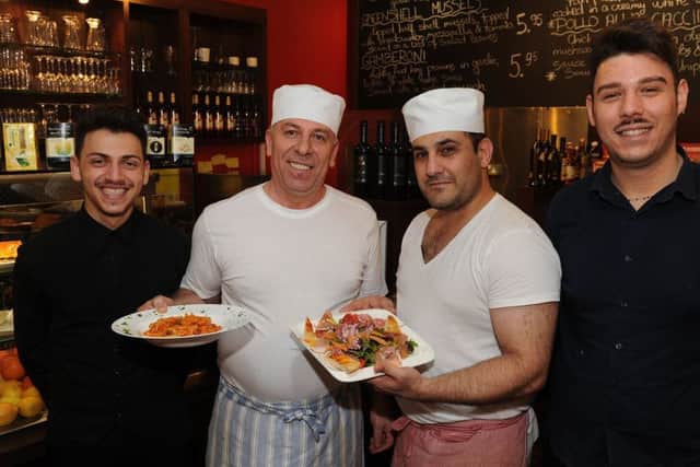 Carmine Filice, Arash Sansolaimani, Besim Krasniqi and Mario Galia at Cafe Piazza.