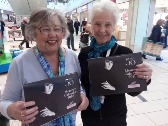 Georgina Mullis and Judy Bowers with their Doncaster Cancer Detection Trust calendars