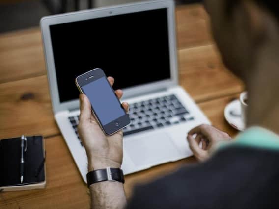 Taking personal calls at work is one of the top ten office annoyances.