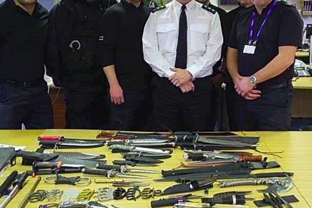 Police show some of the knives seized in Doncaster