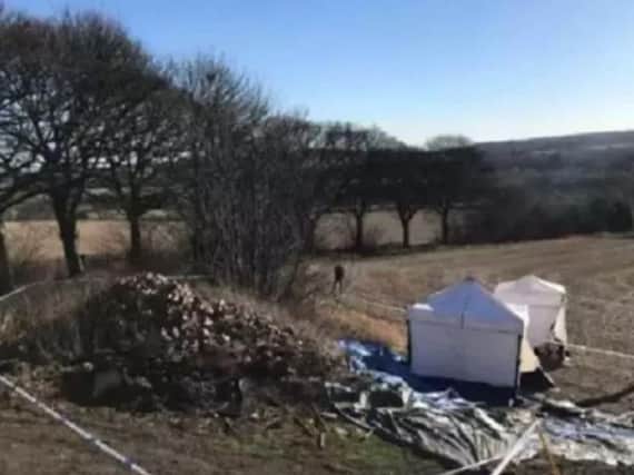Human remains were found buried on land in Swaithe, Barnsley.