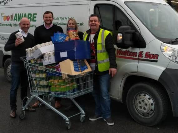 L to r - Paul Trigg, Lidl Area Manager, Craig Stewart,  Lidl Head of Sales, Amy Johnson, Lidl Mexborough Store Manager and Sean Gibbons, MD of Food Aware