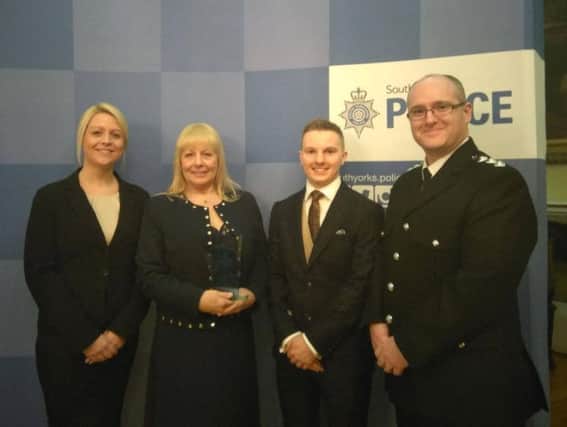 Julie Oliver of the Yorkshire Ambulance Service (second left), SC Louis Ford (second right) and Special Chief Inspector Adrian Fuller (far right).