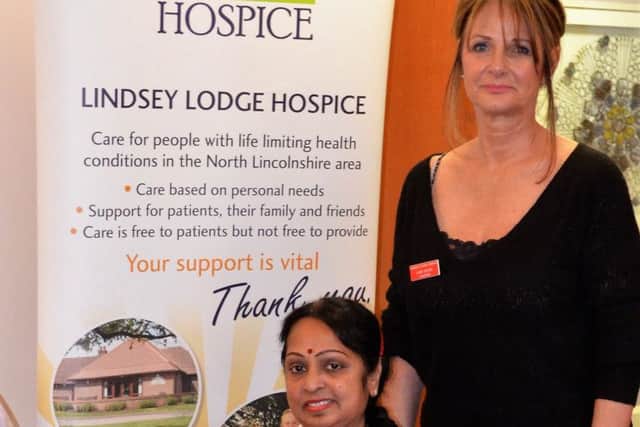 A new-look Uma Vijay visits Lindsey Lodge Hospice to hand over her sponsorship money