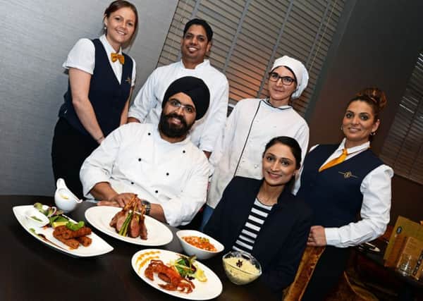 Pictured at Spice & Ice Restaurant and Lounge are, Back l-r Siobhan Tracey, Head Waitress, Mohinder Pal, Tandoor Chef, Laura Birkenbauma, Pastry Chef and Maria Musilova, Waitress. Front l-r Amardeep.S.Anand, Head Chef and Priya Patel, Manager. Picture: Marie Caley NDFP Spice&Ice MC 1