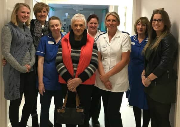 A family have made a special trip to the Intensive Care Unit (ICU) at Bassetlaw Hospital to thank the staff for the care given to a family member, bringing with them a cheque in the sum of Â£1,000