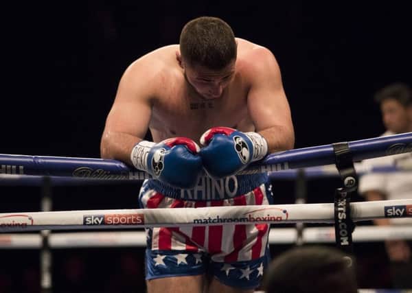 David Allen shows his disappointment after a cut ends his rematch with Lenroy Thomas