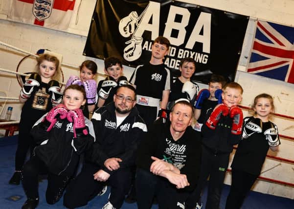 Coaches Damian Banks and Dave Mickleborough, pictured with some of the children that attend the Academy. Picture: Marie Caley NDFP AlmondsBoxing MC 1