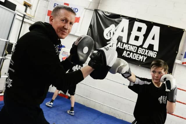 Dave Mickleborough, pictured training with Charlie Banks, 13. Picture: Marie Caley NDFP AlmondsBoxing MC 3