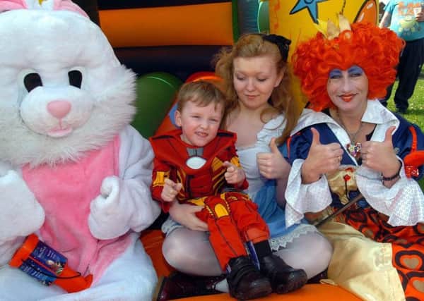 Fundraising event in aid of William Moreland at the Linney Centre, Weston Road.   L/r  Easter Bunny (Nevaeh Ward), Alice (Alexandra Gale), William Moreland and Queen of Hearts Sarah Bradbury.  Picture: Malcolm Billingham