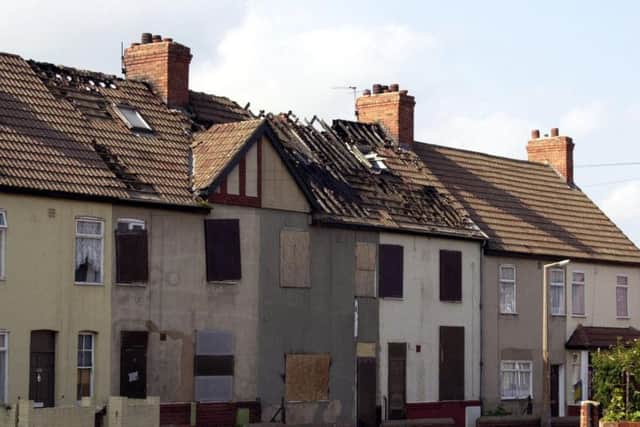 Fire damaged 104 Dixon Avenue, Edlington, in 2000