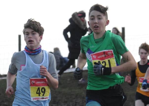 Josh Dickinson, right, finished fourth in Intermediate Boys in the English Schools Cross Country Championships