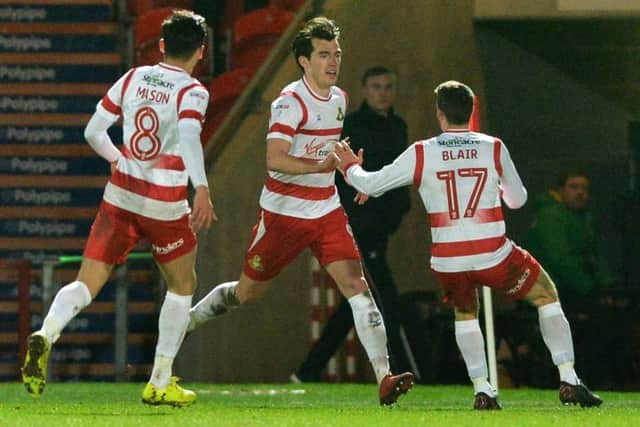 John Marquis, centre, celebrates his second goal in the 2-0 win over Bradford City.