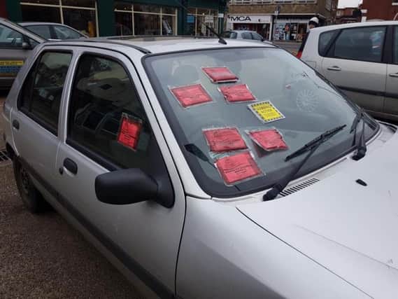 The car covered in tickets in Doncaster town centre.