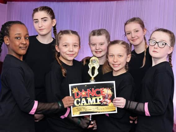 Premonition, take 2nd place in the Under 14 Beginner Street Team , during the Disney Dance Camp.