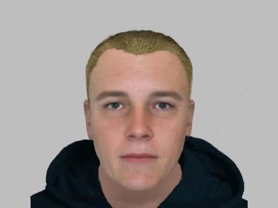 Police would like to speak this man in connection with an incident of fraud in Scawsby.