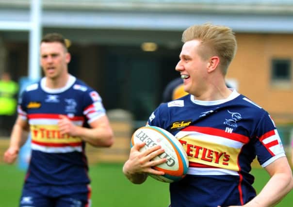 Cameron Cowell cannot hide his joy as he races in another try for Doncaster Knights in their demolition of Ealing