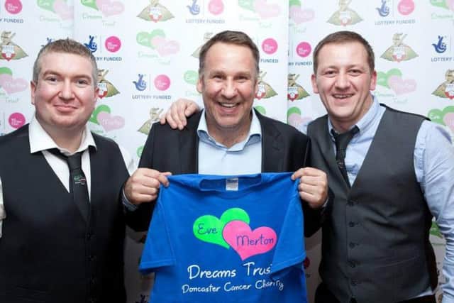 Football star Paul Merson at a fund raiser for the Eve Merton Dream Trust with Martin Lawrence and Clynton Johnson, charity co. founders